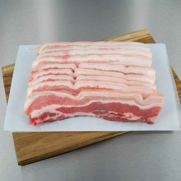 Poitrine de porc avec os tranch&eacute;e 800 g env. (8 tranches de 100 g)
